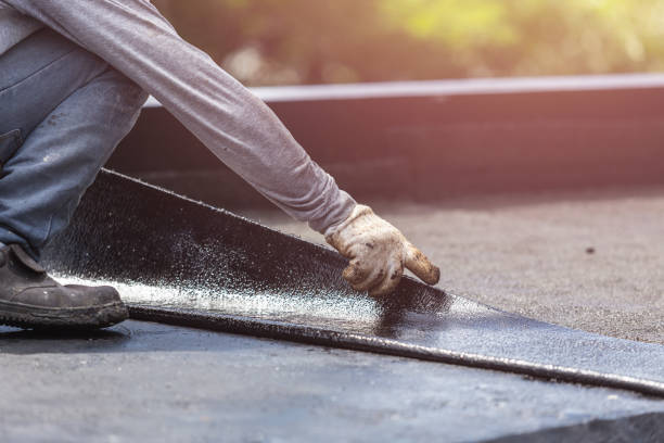 Professional Exterior Waterproofing technician working in Mumford, NY